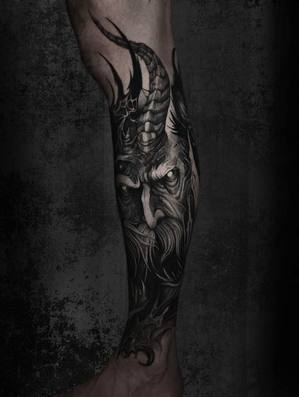 Tattoo artist Uppsala — dark fantasy sleeve with demon face, Tim Blackhands